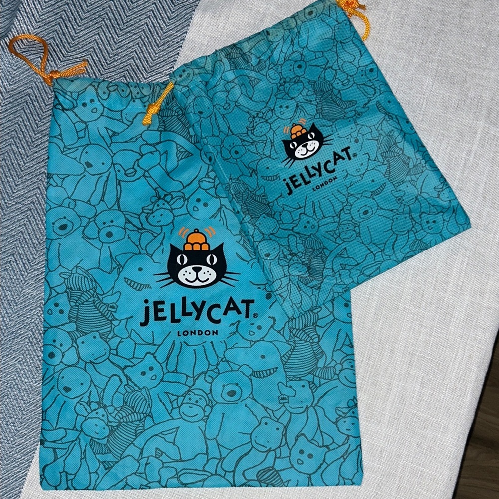 Jellycat Teal Drawstring Bags with Orange Accents